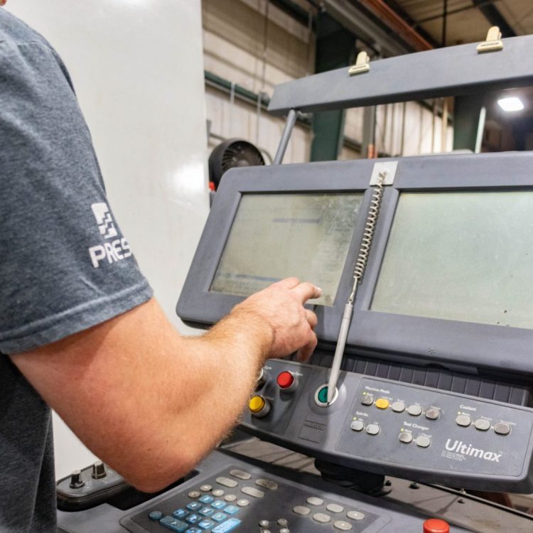 CNC machinist programming Hurco VMX50 machine control